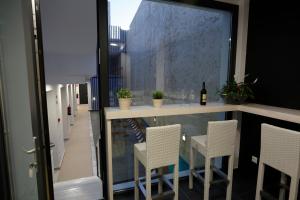 Nápoje v ubytování La Pasajera Hostal Boutique