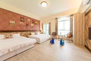 Katil atau katil-katil dalam bilik di Sky Bird Garden B&B