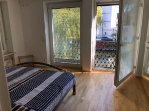 Ein Bett oder Betten in einem Zimmer der Unterkunft Ferienwohnung Amperblick Fürstenfeldbruck