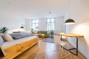 Svetainės erdvė apgyvendinimo įstaigoje Design Apartments - "Im Holländerviertel" - Benkert 2