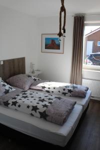 Postel nebo postele na pokoji v ubytování Ferienhaus Hof Beel