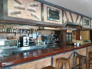 The lounge or bar area at Apartamentos El Cazador