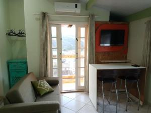 Μια τηλεόραση ή/και κέντρο ψυχαγωγίας στο Pousada Requinte da Mantiqueira