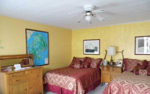 Voodi või voodid majutusasutuse Otter Creek Inn toas