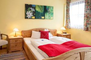 Letto o letti in una camera di Pension Gruber