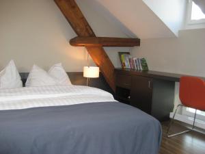 Voodi või voodid majutusasutuse Altstadt Hotel toas