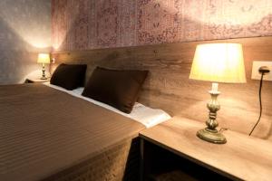 Uma cama ou camas num quarto em Old Side Boutique Hotel