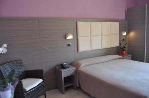 Postel nebo postele na pokoji v ubytování Hotel Playa + 37 fotografií