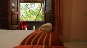 Postel nebo postele na pokoji v ubytování Chackalakkal Home Stay