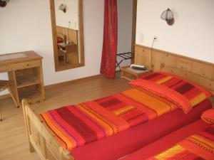 Letto o letti in una camera di Logis de la Licorne