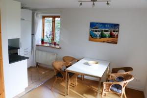 Kuchyň nebo kuchyňský kout v ubytování Ferienwohnung mit Tiny House