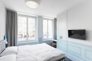 Ένα ή περισσότερα κρεβάτια σε δωμάτιο στο Boutique & Art Hotel Helvetia