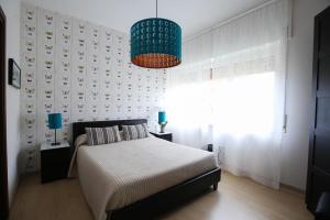 Posteľ alebo postele v izbe v ubytovaní Bernini 20
