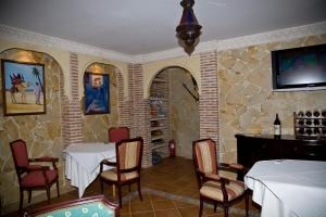 Televízia a/alebo spoločenská miestnosť v ubytovaní Casa Rural Sidonia