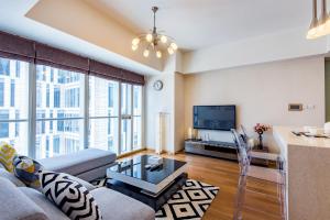 TV a/nebo společenská místnost v ubytování S6 Service Apartment（Chengdu Chunxi Road Taikoo Li Branch）