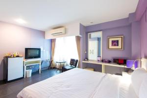 Postel nebo postele na pokoji v ubytování Lilac Relax-Residence