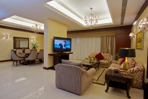 En tv och/eller ett underhållningssystem på Concorde Hotel - Fujairah