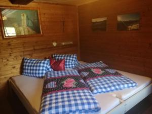 Posteľ alebo postele v izbe v ubytovaní Ferienhaus Grofn