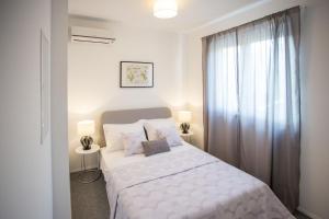 Posteľ alebo postele v izbe v ubytovaní Villa Elysium - beautiful family house with heated pool