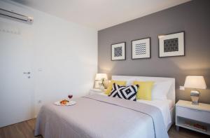 Posteľ alebo postele v izbe v ubytovaní Villa Elysium - beautiful family house with heated pool
