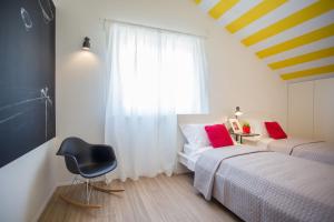 Posteľ alebo postele v izbe v ubytovaní Villa Elysium - beautiful family house with heated pool