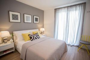 Posteľ alebo postele v izbe v ubytovaní Villa Elysium - beautiful family house with heated pool