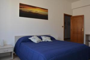 Posteľ alebo postele v izbe v ubytovaní Vittori Apartment