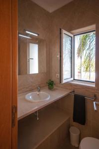 Ванна кімната в Boliqueime Villas