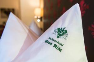 Postel nebo postele na pokoji v ubytování Wellness Hotel Gran Risa***S