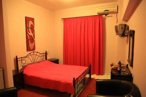 Postel nebo postele na pokoji v ubytování Argo Apartments