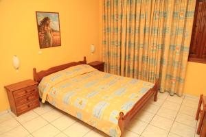 Postel nebo postele na pokoji v ubytování Argo Apartments