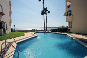 Bazén v ubytování Marina Bay Playa del Cristo nebo v jeho okolí