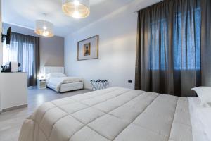 Ліжко або ліжка в номері Matera In Vacanza