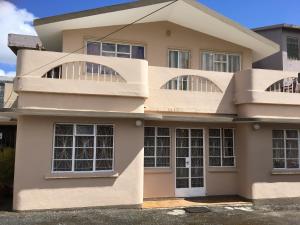 a house in the suburbs of melbourne at BR Apartment & Studios in Curepipe