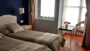Postel nebo postele na pokoji v ubytování Casa de marinos UribeKosta + 10 fotografií