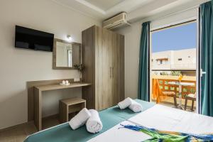 TV a/nebo společenská místnost v ubytování Sisi Breeze Hotel
