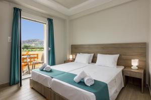 Postel nebo postele na pokoji v ubytování Sisi Breeze Hotel