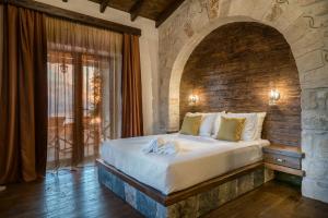 Кровать или кровати в номере Amara Villa