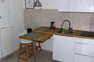 Kuchyňa alebo kuchynka v ubytovaní Jazzy Apartment Zagreb