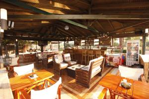 Posezení v ubytování Ariadni Hotel Bungalows