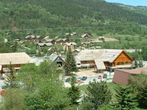 an aerial view of a small town in a mountain at Serrecheholidays in Serre Chevalier