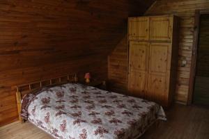 Postel nebo postele na pokoji v ubytování Viesu nams Barži