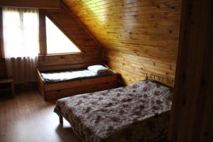 Postel nebo postele na pokoji v ubytování Viesu nams Barži