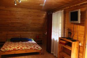 Postel nebo postele na pokoji v ubytování Viesu nams Barži