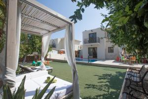 a view of the backyard of a villa at Artemisia Villa in Protaras