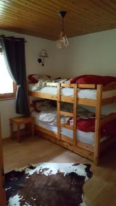 Postel nebo postele na pokoji v ubytování "Chalet le Dahlia - 4 Vallees"
