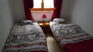 Postel nebo postele na pokoji v ubytování "Chalet le Dahlia - 4 Vallees"