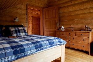 Ένα ή περισσότερα κρεβάτια σε δωμάτιο στο Srub Bublava 806