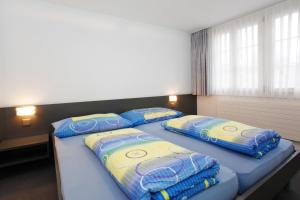 Voodi või voodid majutusasutuse Hotel Krone toas