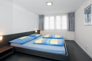 Voodi või voodid majutusasutuse Hotel Krone toas